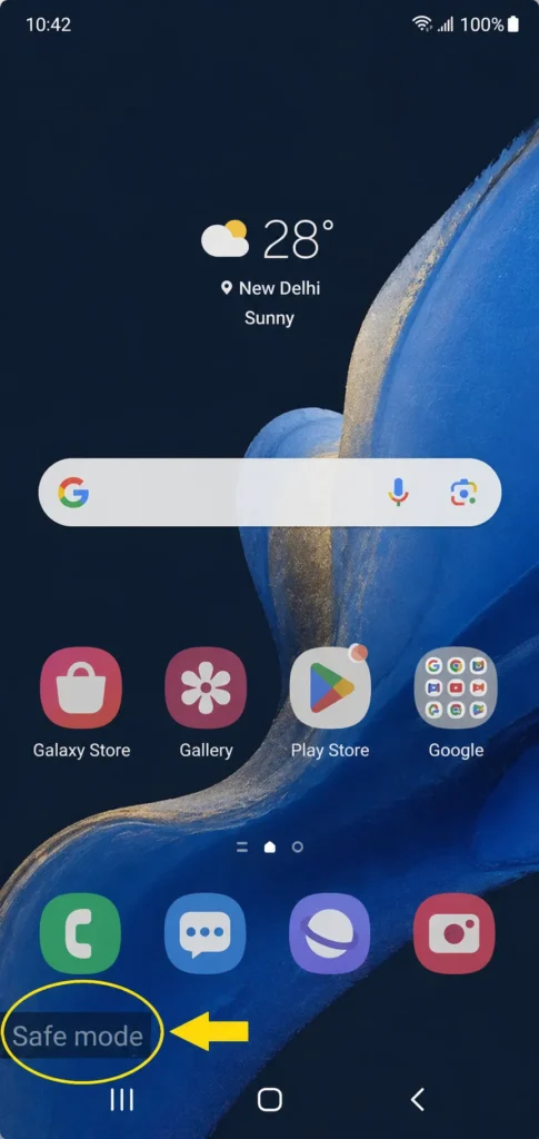 Android home screen showing Safe Mode text indicator in bottom-left 
corner confirming device is running in safe mode