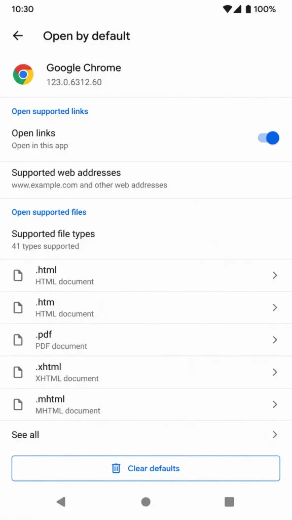 Android app settings showing the Open by default screen with file type associations listed and Clear defaults button at the bottom